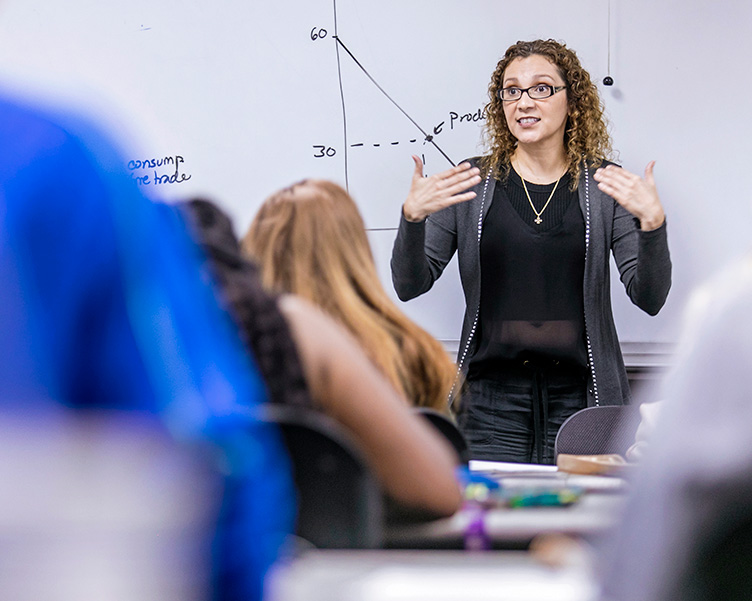 A professor teaches a class in the MBA program