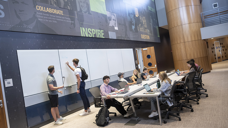 Students in the Lowth Entrepreneurship Center collaborating on a project.
